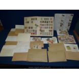 A Stamp album and contents including English and foreign stamps,