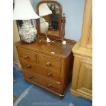 A compact Satinwood Dressing Chest of two long and two short Drawers, some losses,