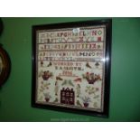 A framed Victorian Sampler worked in cross-stitch by E.A.