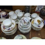 A Royal Worcester 'Evesham' part Teaset including 15 cups and saucers, two chipped, 12 tea plates,