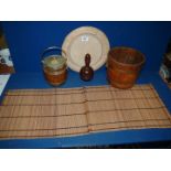 A quantity of miscellanea including carved breadboard, turned wood masher,