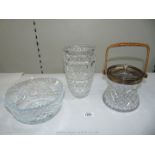Three cut glass items including silver rimmed biscuit barrel with odd white metal lid,