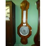 An Art Deco style aneroid barometer.