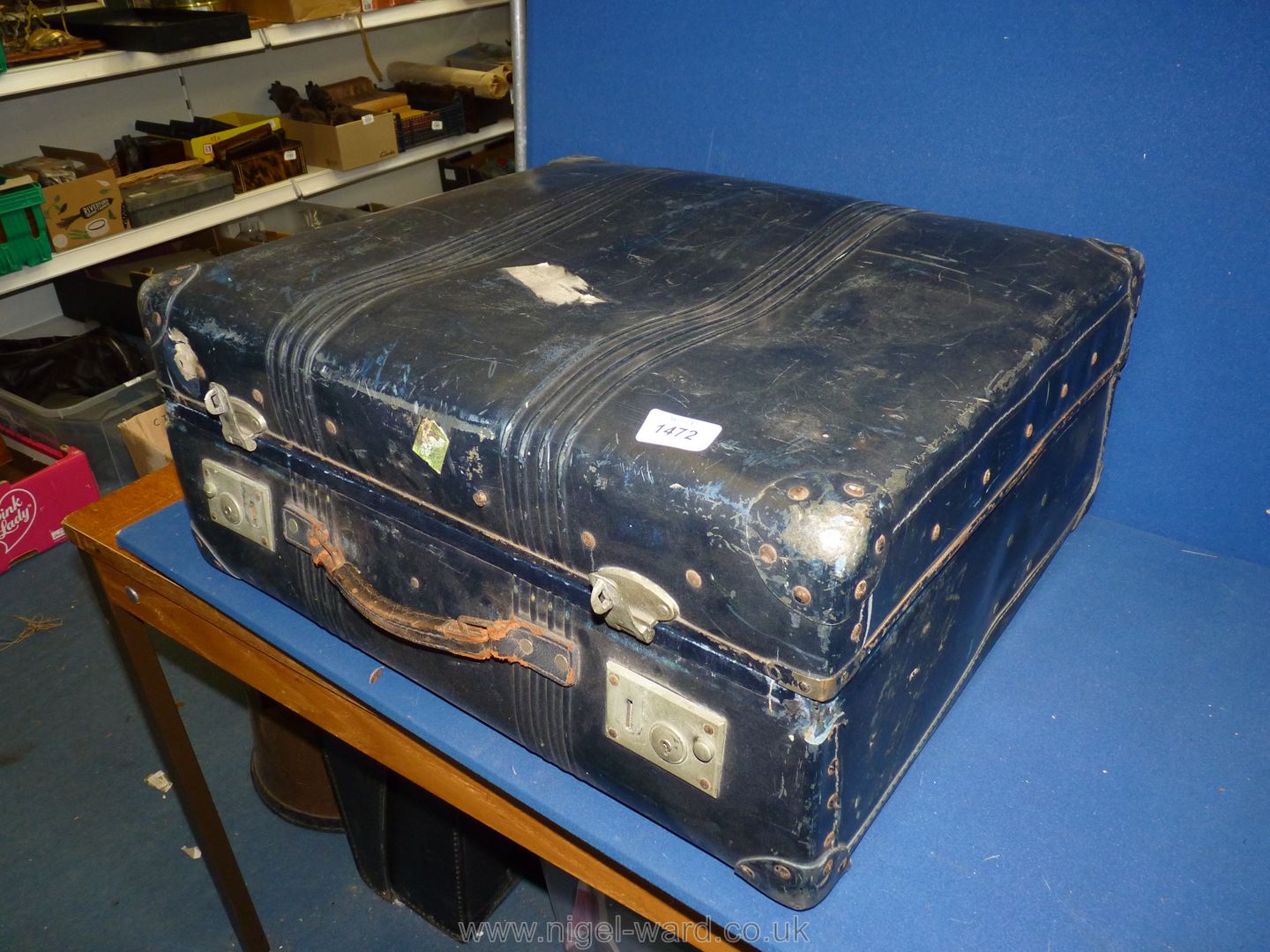 A large black Travel Case by "Rev-Robe, England" with fabric lining and met al rods to interior,