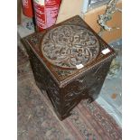 An appealing heavily carved darkwood Sewing Box,