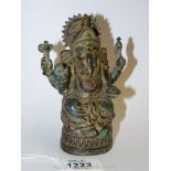 An old bronze figure of Ganesh seated holding attributes, wear and traces of gilding, 5 1/4" tall.