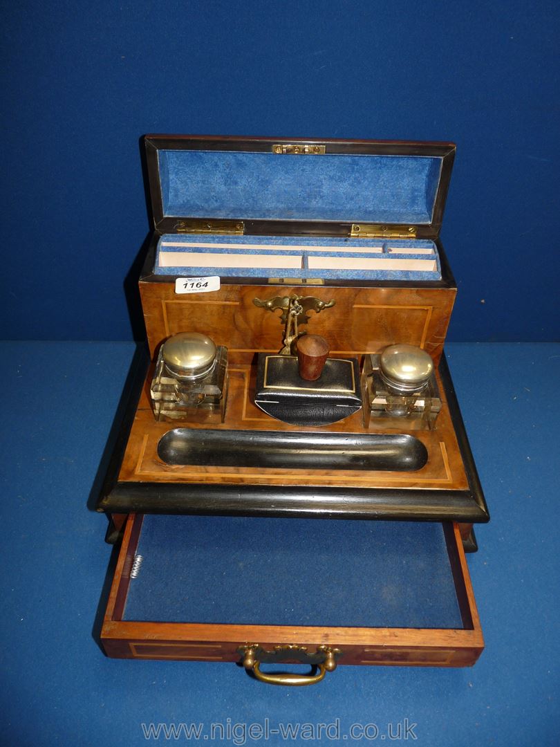 A Walnut and ebonised inlaid Desk stand with pair of glass inkwells, single drawer and blotter,