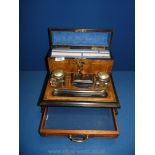 A Walnut and ebonised inlaid Desk stand with pair of glass inkwells, single drawer and blotter,