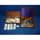 A Mahogany box with compasses, pens etc and a box of Swann & Morton surgical blades and knives.