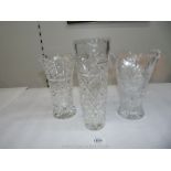 Three glass vases, 8'' and 10'' tall.