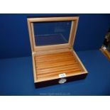 A glass topped Humidor, 12'' x 9 1/4'' x 4''.