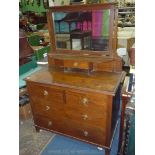 A 1930/40's Oak Dressing Chest of two long and two short drawers with bevelled swing mirror,