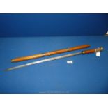 A Bamboo Sword Stick with spring release mechanism and three brass collars and knop,