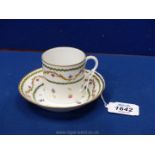 A Paris Rue Thiroux (Manufacture de la Reine) coffee can and saucer decorated with flowers and
