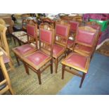 A set of six Oak framed Arts and crafts style Dining Chairs standing on square front legs and