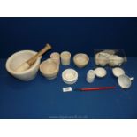 A Wedgwood Pestle and Mortar and a small quantity of ceramic laboratory items including mortars,