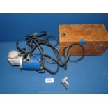 A Schrader Electric air pump, model 202 - DCI 12 v in wooden box, 9" x 5".