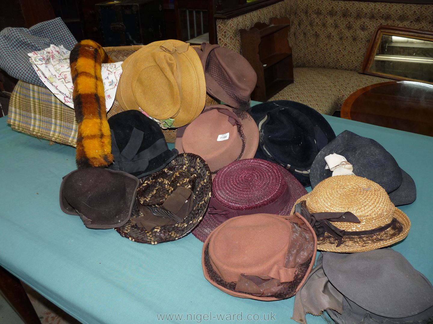 A 1940's basket of vintage ladies Sunday hats