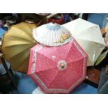 Two Ladies Umbrellas, one green with ruffled edge,