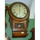 A Mahogany and other woods Wall Clock having multi-colour crossbanding,