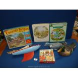 A vintage sailing boat, painted duck, selection of puzzles and a mid 20th c.