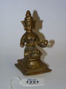 An Indian 19th century village Bronze of seated goddess holding a sceptre, 4 1/4" tall.