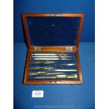 A Mahogany cased set of brass and ivory drawing instruments, box size 7 3/4'' x 5 1/2'' x 1 3/4''.