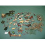 A box of well played with Britains 1920's lead farmyard animals.