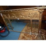 A gold painted triple Over-mantel Mirror having bevelled glass,