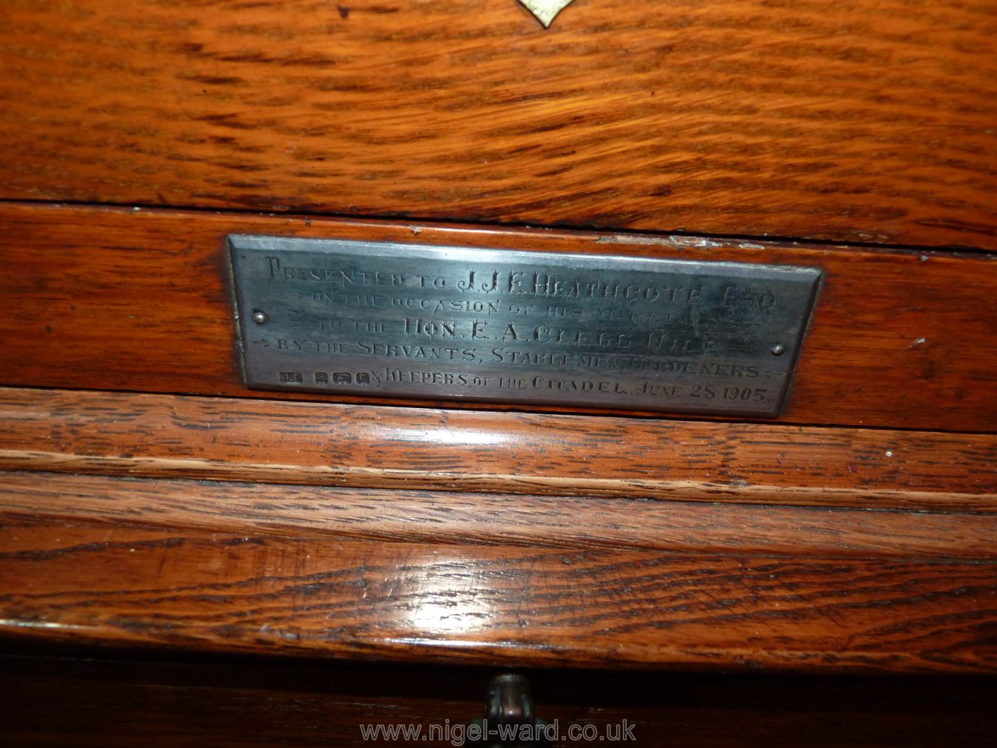 A good Oak three decanter Tantalus on a stand, mirror backed with brass fittings and carry handles. - Image 3 of 6