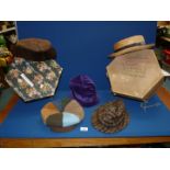 Two vintage Hat Boxes including a purple velvet hat, Edward Mann leather cap, sheepskin cap, etc.