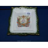 A collectible 1897 Queen Victoria Diamond Jubilee Staffordshire wall plaque with green trim