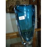 A heavy Waterford Crystal vase in light blue, 12" tall.