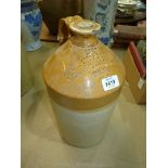 A Stoneware Flagon marked T.W. Purchas & Co., Wine & Spirits, Ross, 13'' tall.