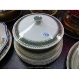 A Crown Ducal dinner service comprising two tureens, one large meat platter, six dinner plates,