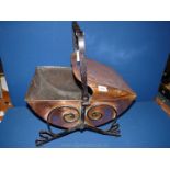 A late 19th c. Arts and Crafts copper Coal Scuttle with wrought iron handles and mounts.