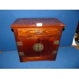 A small dark wood chest with one drawer and four compartments, possibly an apprentice piece,