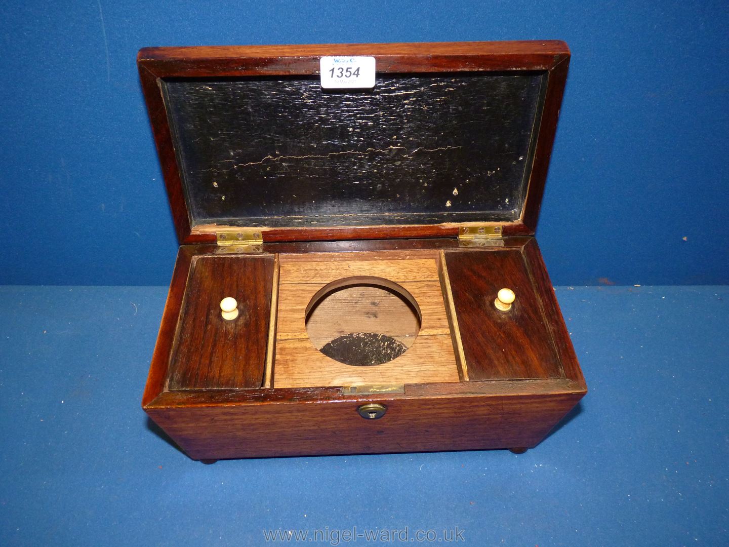 An Oak sarcophagus Tea Caddy with beaded detail to edge, two compartments, 12" x 6 1/2".