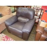 A modern dark brown upholstered manually reclining Fireside Armchair.