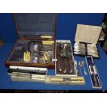 An Arthur Price of England carving set, cased Mother of Pearl handled fish eaters,