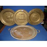 Three large brass chargers, two depicting ships in relief pattern 17" diameter approx.