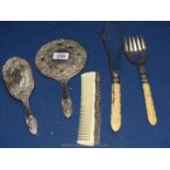 A white metal dressing table set and a set of fish servers (handles cracked).