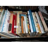A box of books to include; Painting Landscapes in Watercolour, The Story of Art, Printed Ephemera,