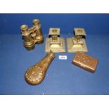 A pair of brass binoculars, candle holders, copper powder pouch and brass box.