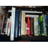 A box of books to include; British villages, The Art of Illuminated Manuscripts,