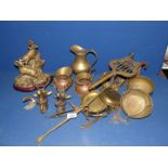A box of miscellaneous brass including balance scales, jugs, animal figures, an EPNS cruet set,