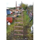 A 7 rung wooden step ladder.