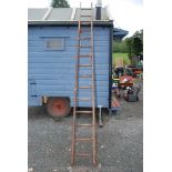 A 15 rung wooden ladder.