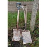 Four various spades and shovels.