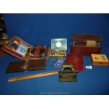 A box of miscellanea including a gentleman's travel case, a pack of cards,